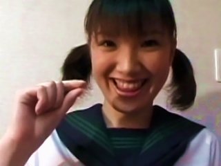 Pigtailed Japanese Chick Plays With Her Puss Teen Video